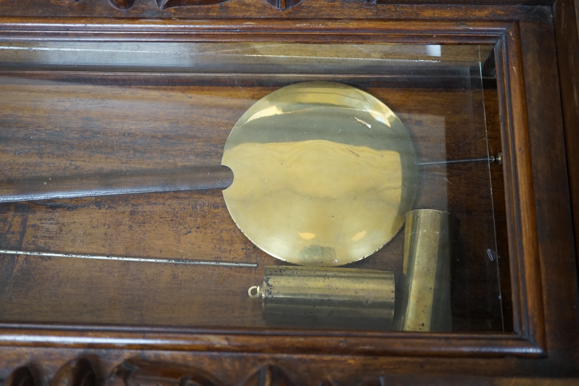 An early 20th century mahogany Vienna wall clock, 122cm. Condition - fair, glass loose, not tested as working